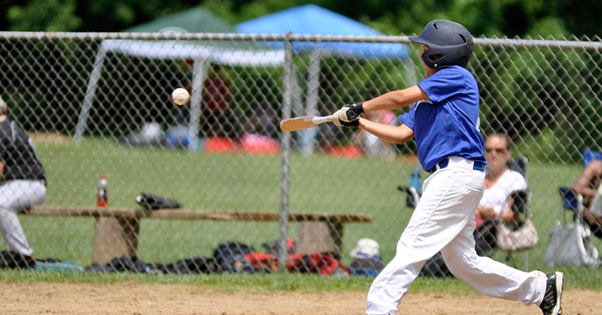 Boy who was diagnosed with pediatric cancer playing baseball